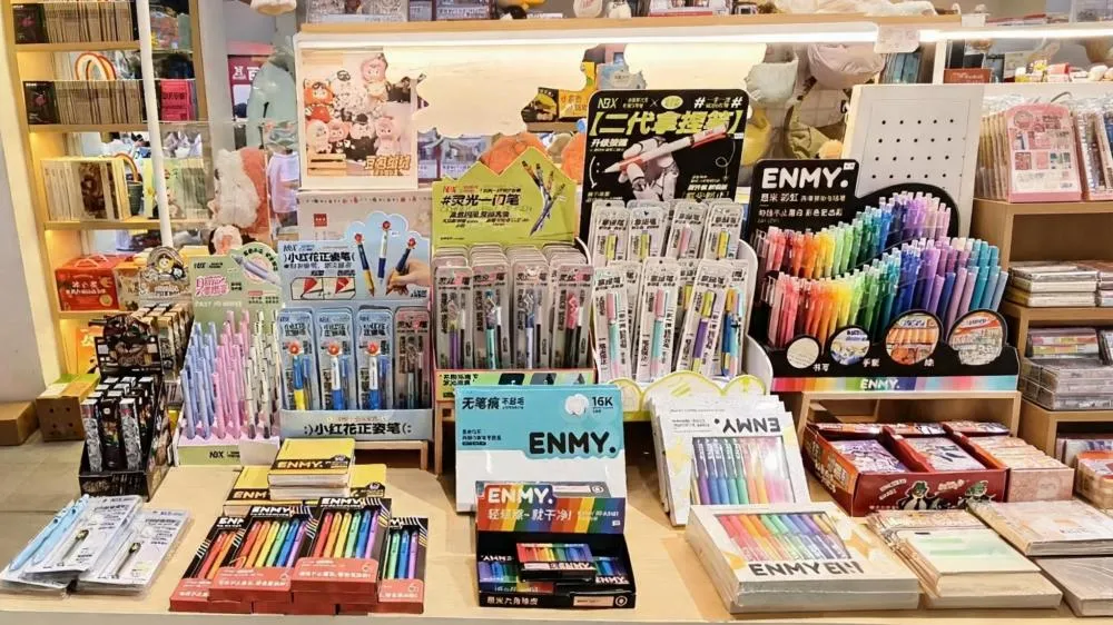 NBX stationery products displayed in a retail store